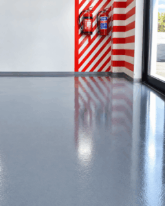 Seamless epoxy floor coating in industrial warehouse